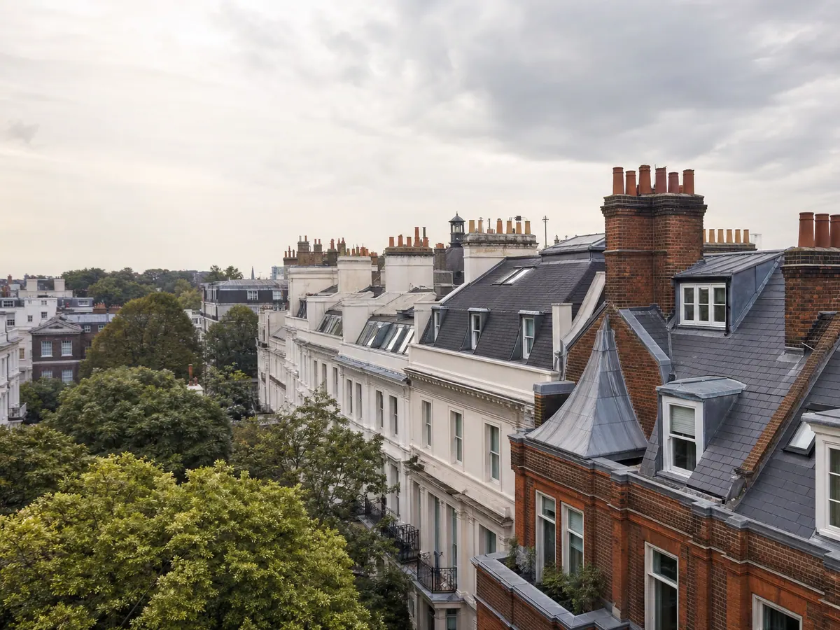 Pitched slate roofs across a terrace of period townhouses